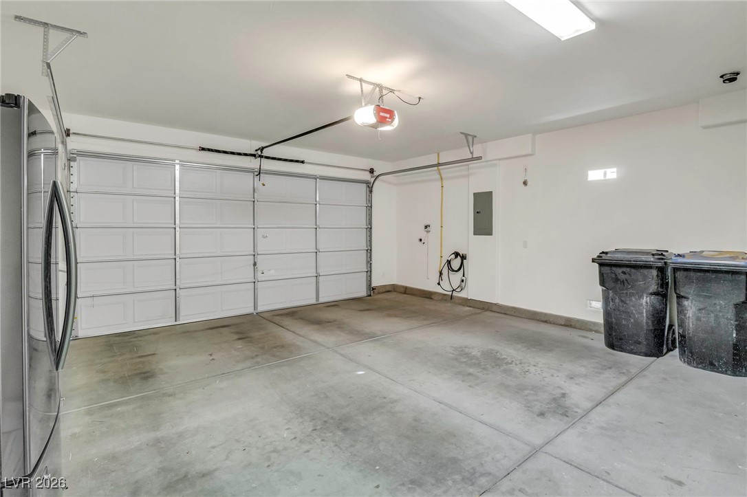 2709 Rue Toulouse Avenue Henderson, NV 89044 - Photo 41 of 43 2 Car Garage with Fridge and Storage Cabinets