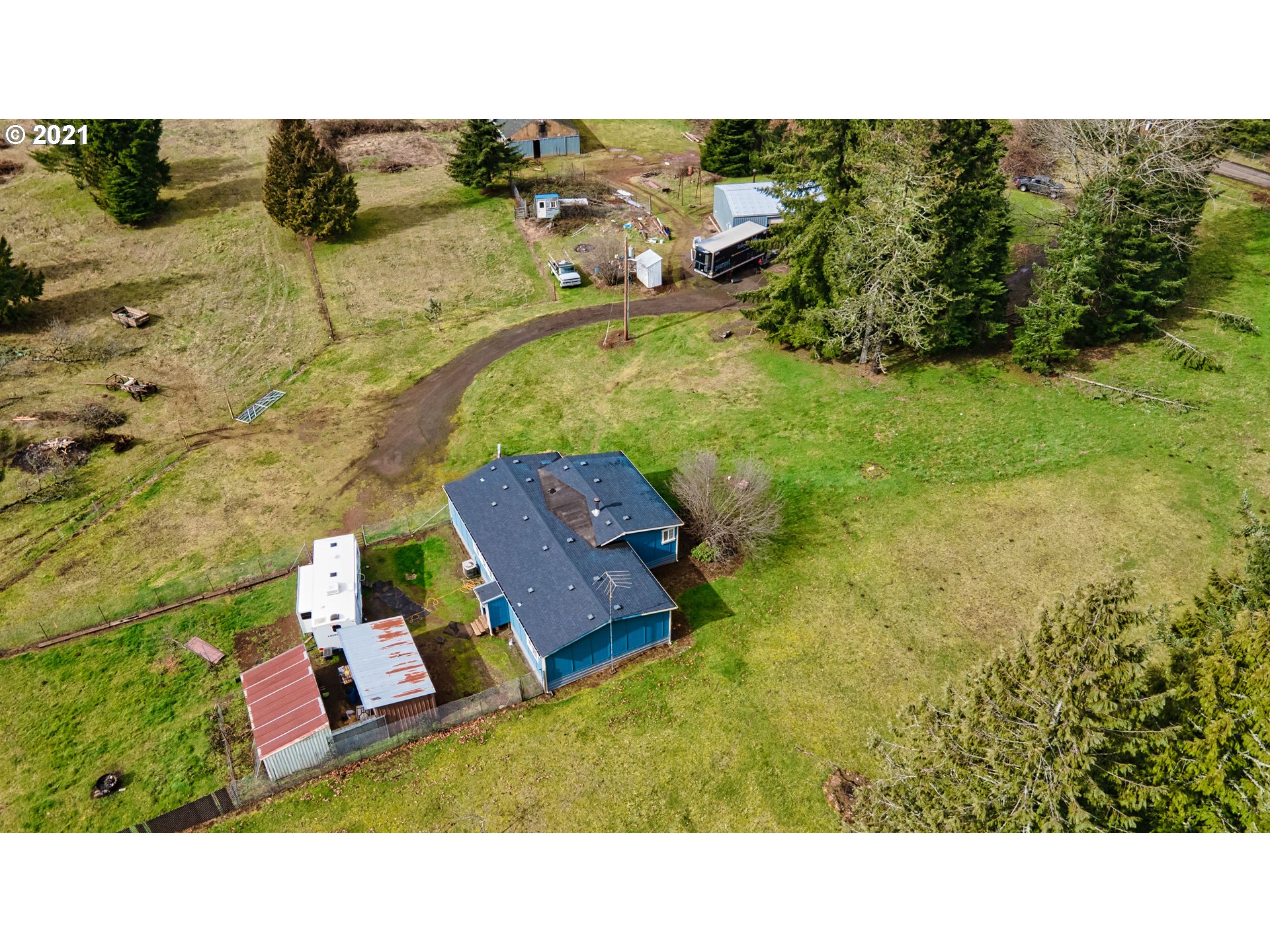 26747 South Shibley Road Colton, OR 97017 - Photo 2 of 13 a aerial view of a house with a yard