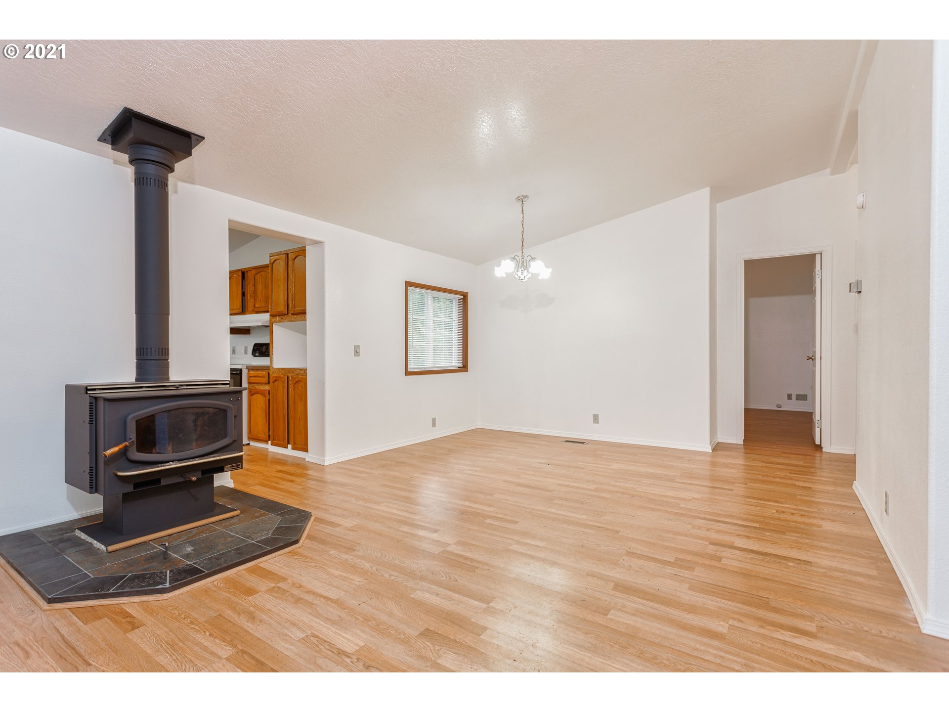26747 South Shibley Road Colton, OR 97017 - Photo 8 of 13 a view of livingroom with furniture and wooden floor