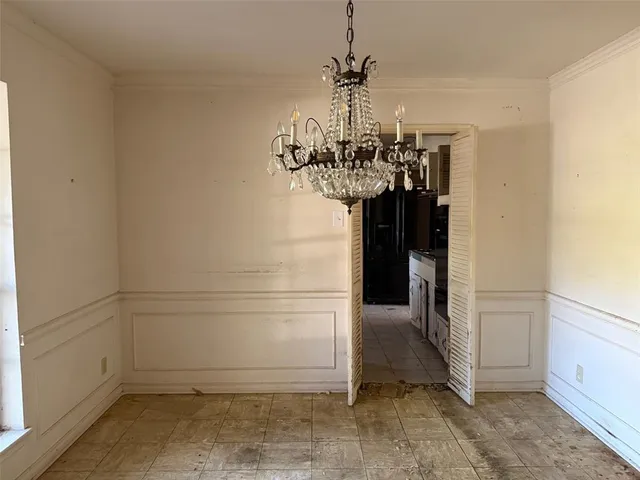 a view of a hallway to a room