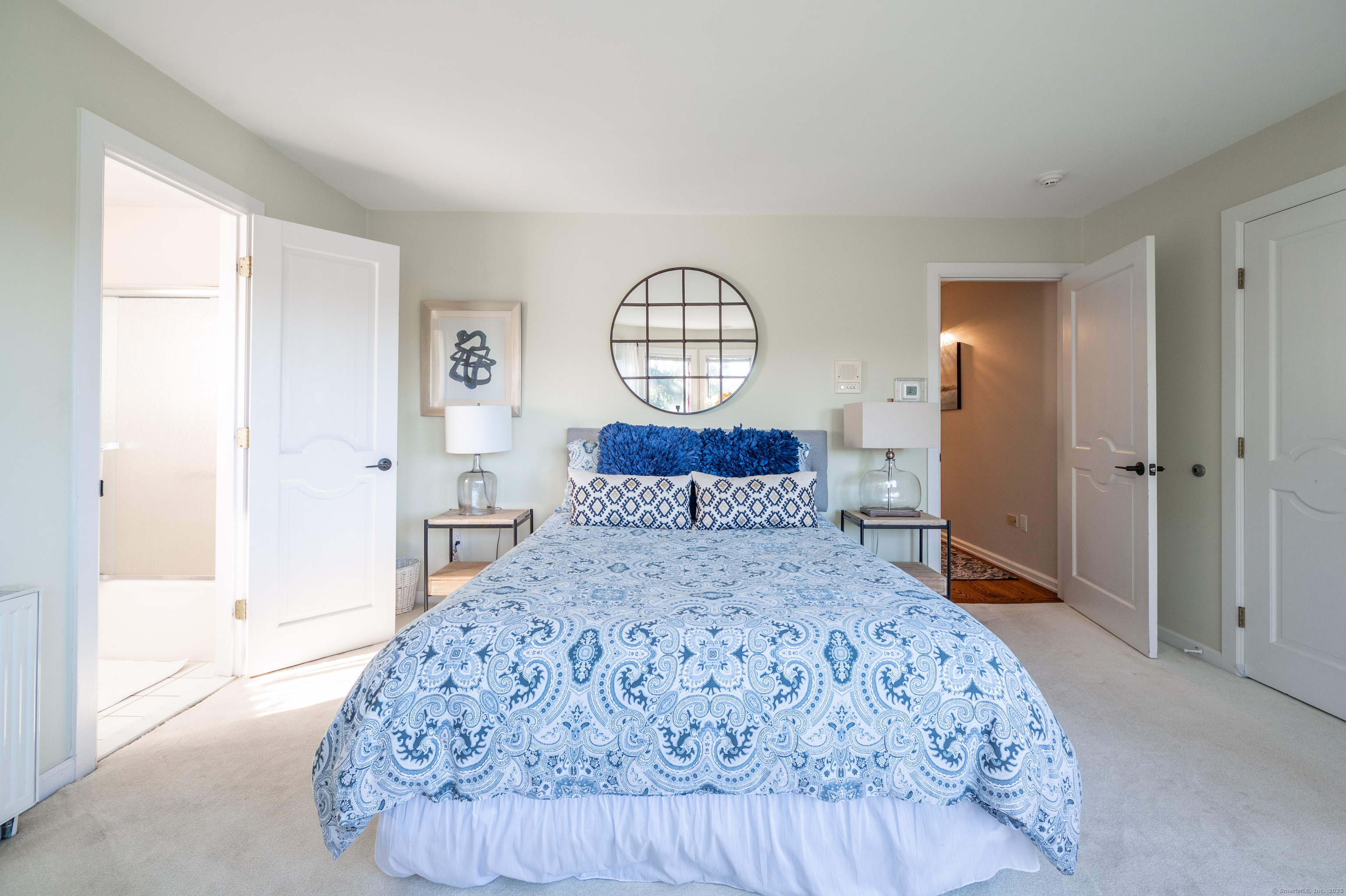 20 Shore Road Danbury, CT 06811 - Photo 13 of 40 a bedroom with a bed and a window