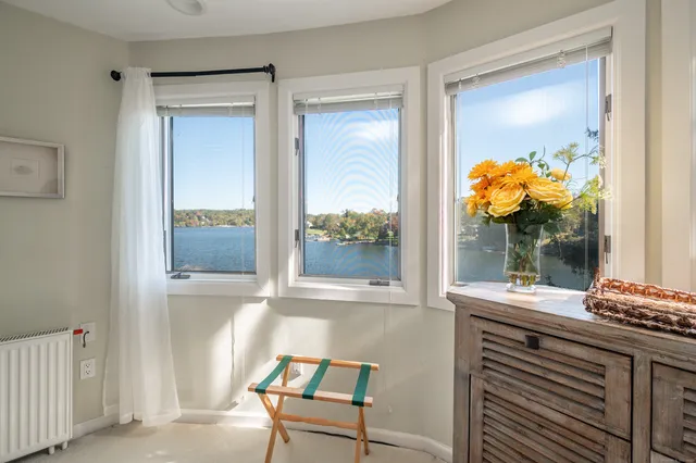 a bathroom with a sink vanity and mirror