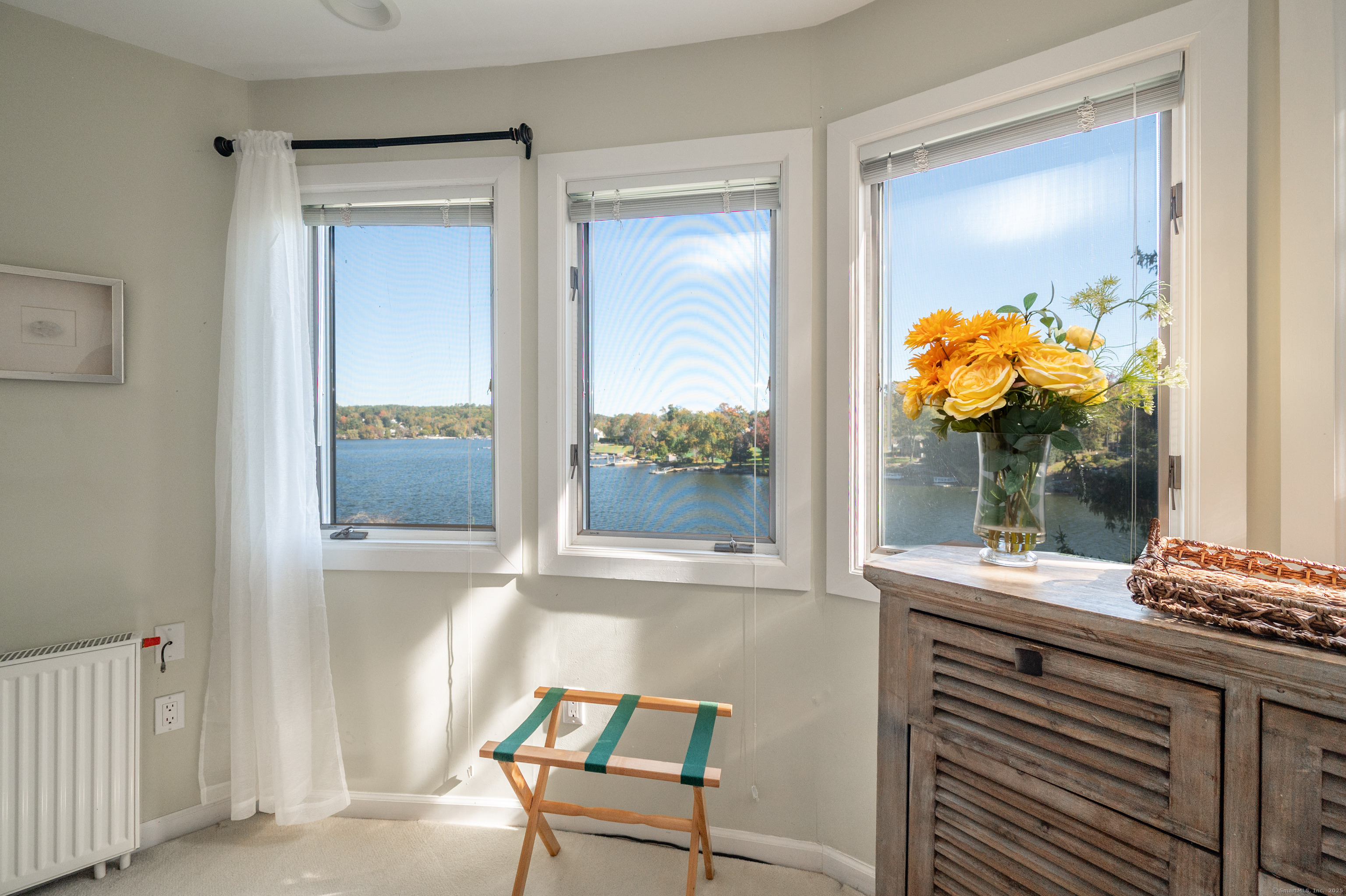 20 Shore Road Danbury, CT 06811 - Photo 14 of 40 a bathroom with a sink vanity and mirror