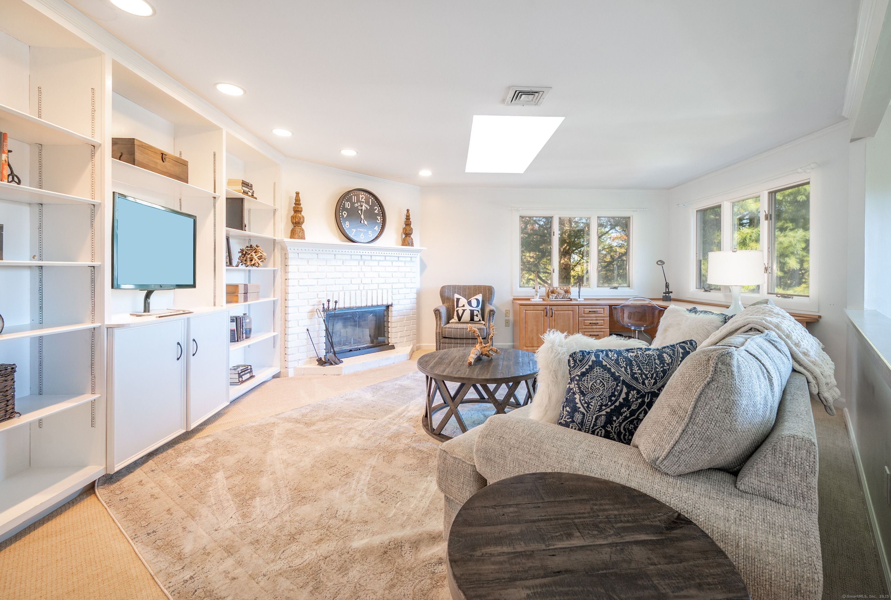 20 Shore Road Danbury, CT 06811 - Photo 17 of 40 a living room with furniture and a large window