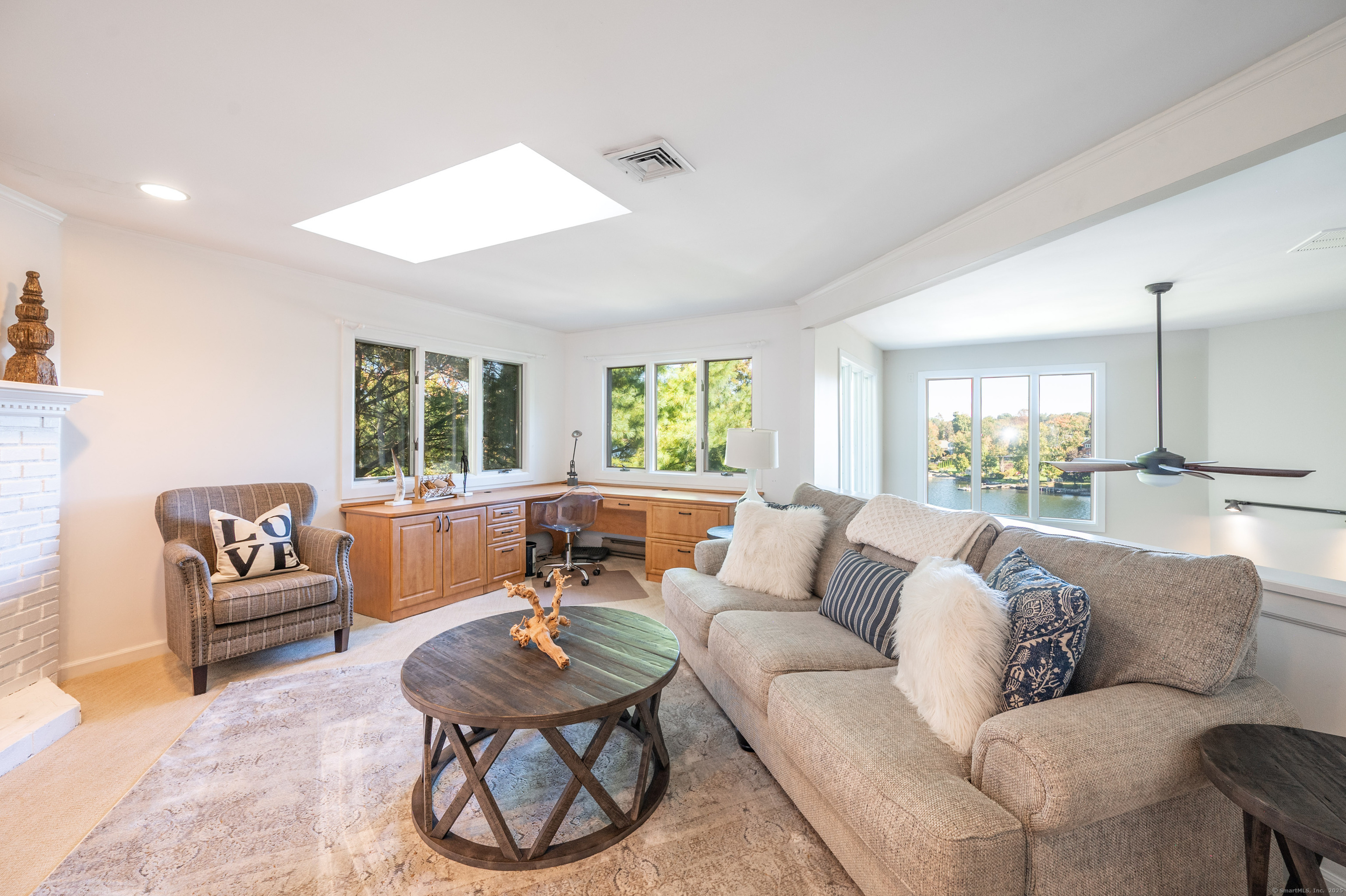 20 Shore Road Danbury, CT 06811 - Photo 18 of 40 a living room with furniture and a large window
