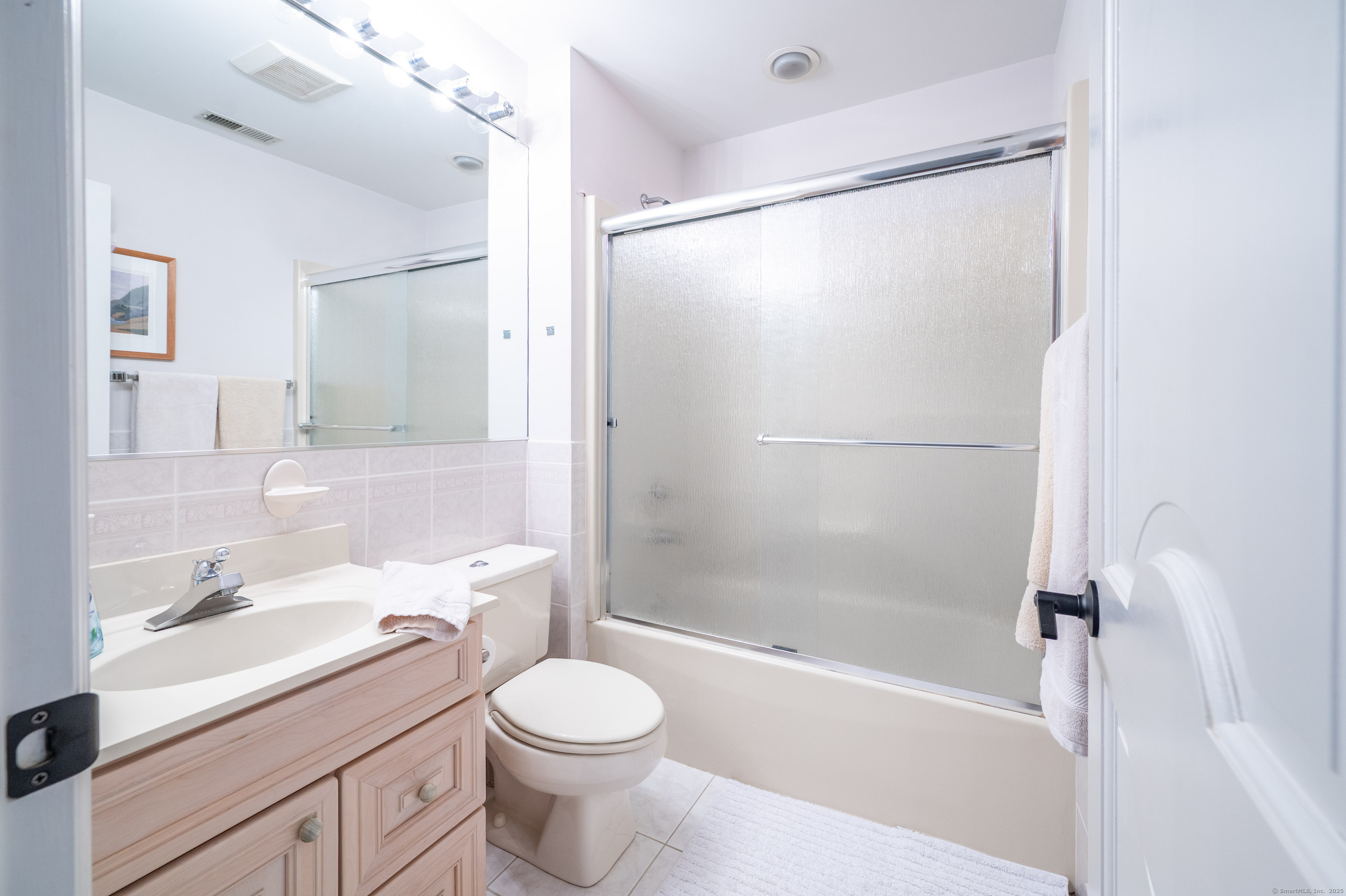 20 Shore Road Danbury, CT 06811 - Photo 28 of 40 a bathroom with a sink toilet and shower