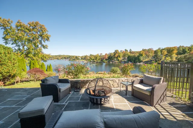 a view of a patio with couches chairs and a table
