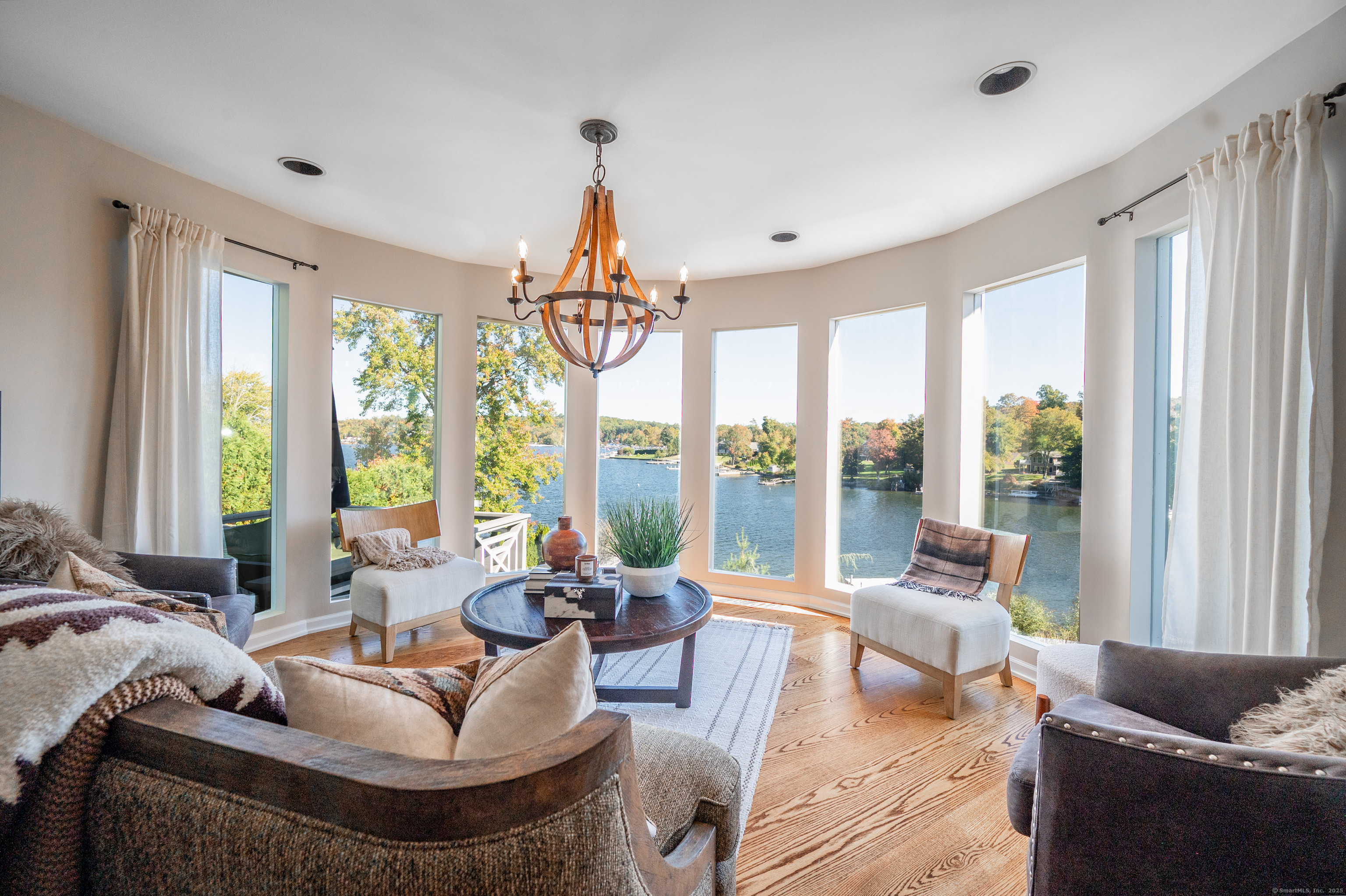 20 Shore Road Danbury, CT 06811 - Photo 8 of 40 a living room with furniture and a large window