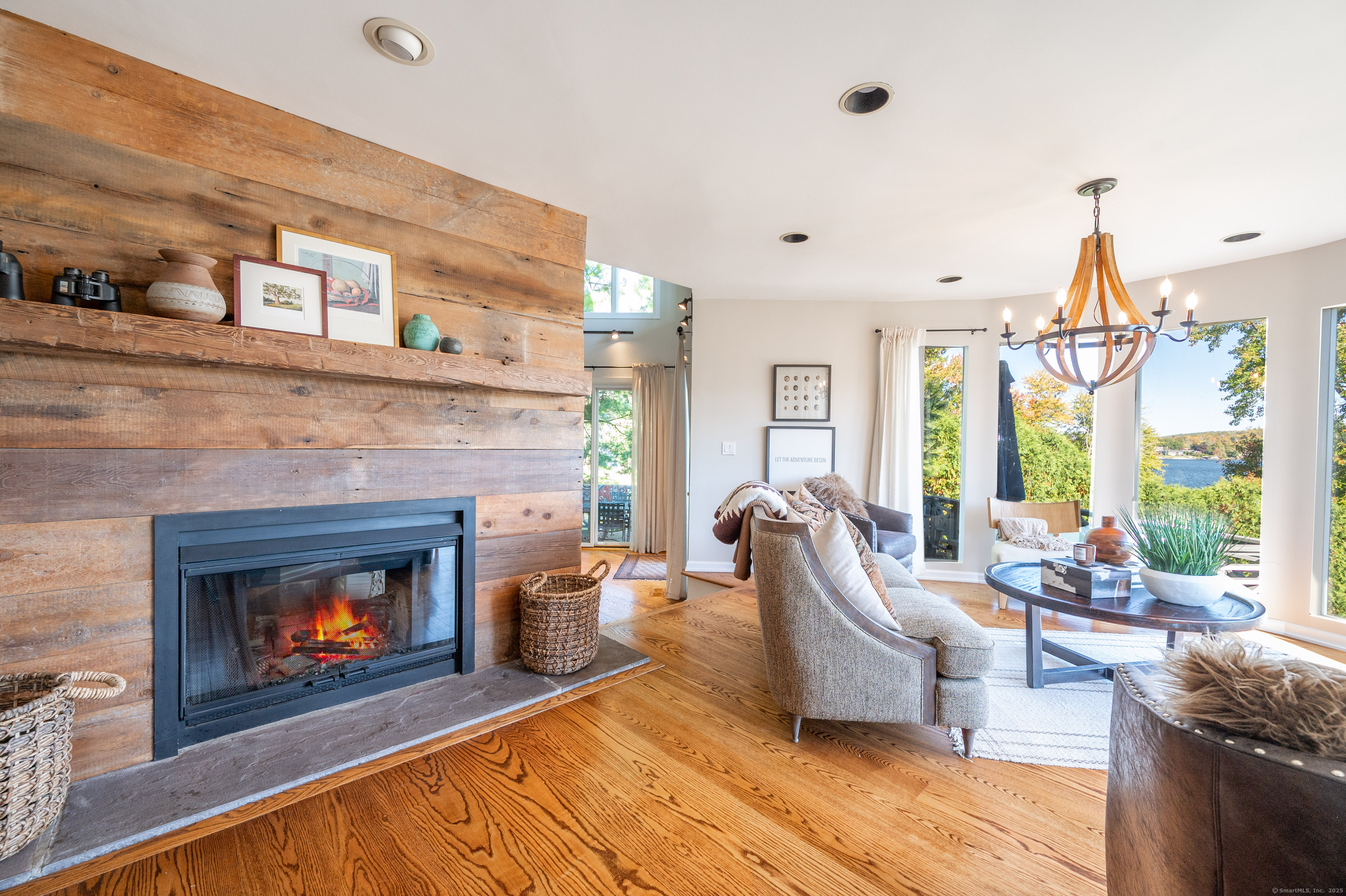 20 Shore Road Danbury, CT 06811 - Photo 9 of 40 a living room with furniture and a fireplace