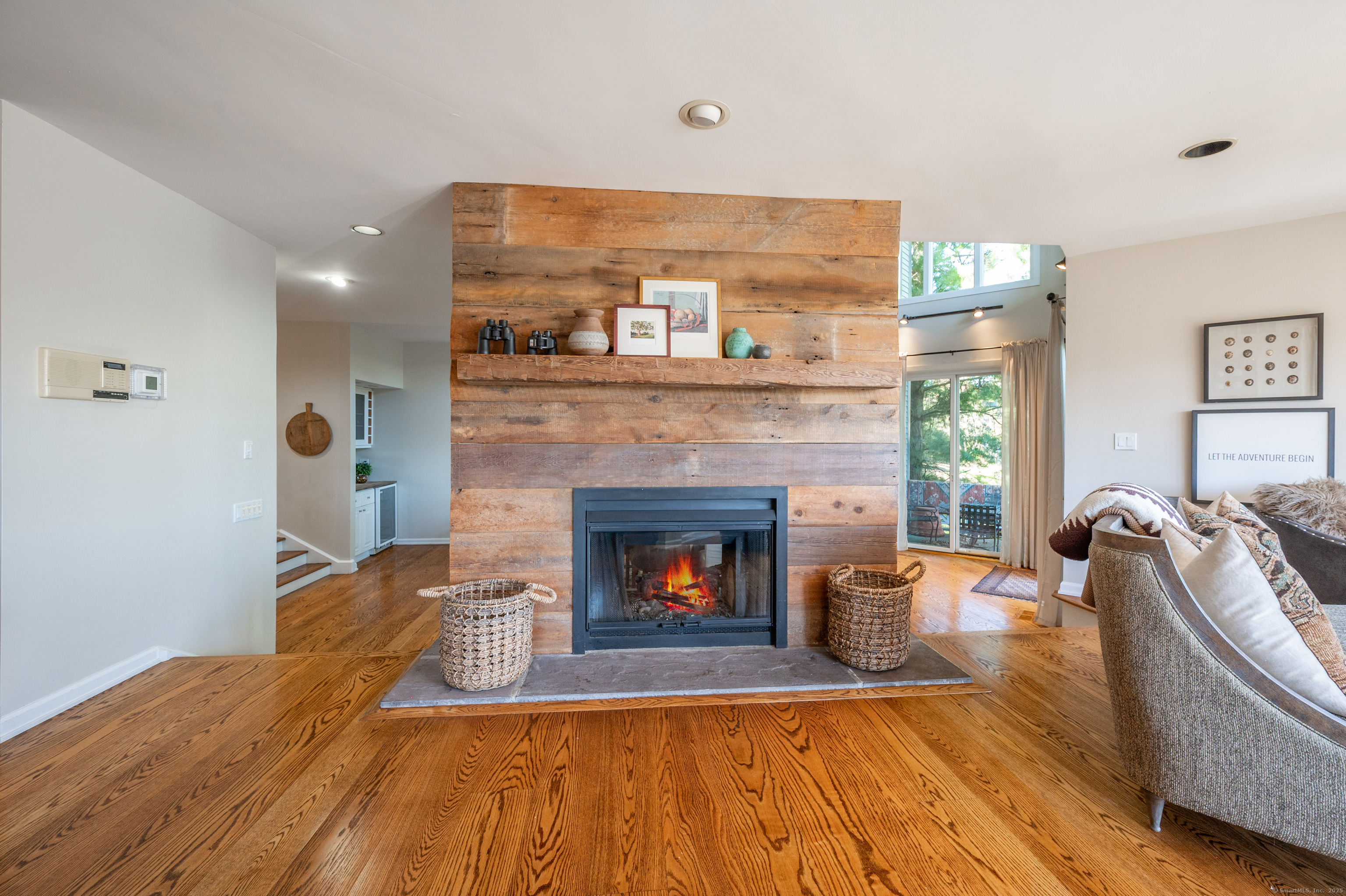 20 Shore Road Danbury, CT 06811 - Photo 10 of 40 a living room with furniture and a fireplace