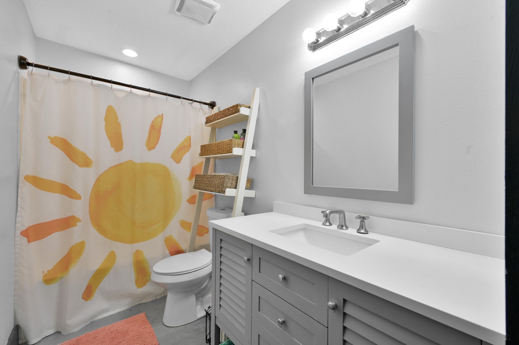 315 Cessna Road Trinity, TX 75862 - Photo 21 of 37 a bathroom with a toilet sink and mirror