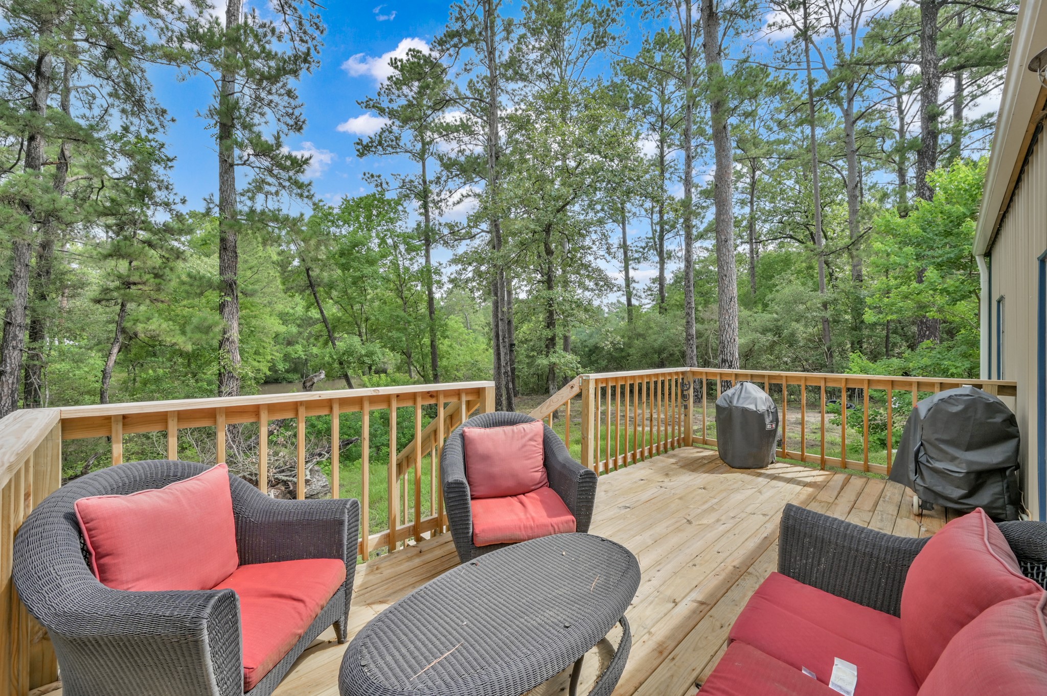 315 Cessna Road Trinity, TX 75862 - Photo 24 of 37 a view of a chair in the deck of a house
