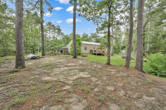 a view of a house with a garden