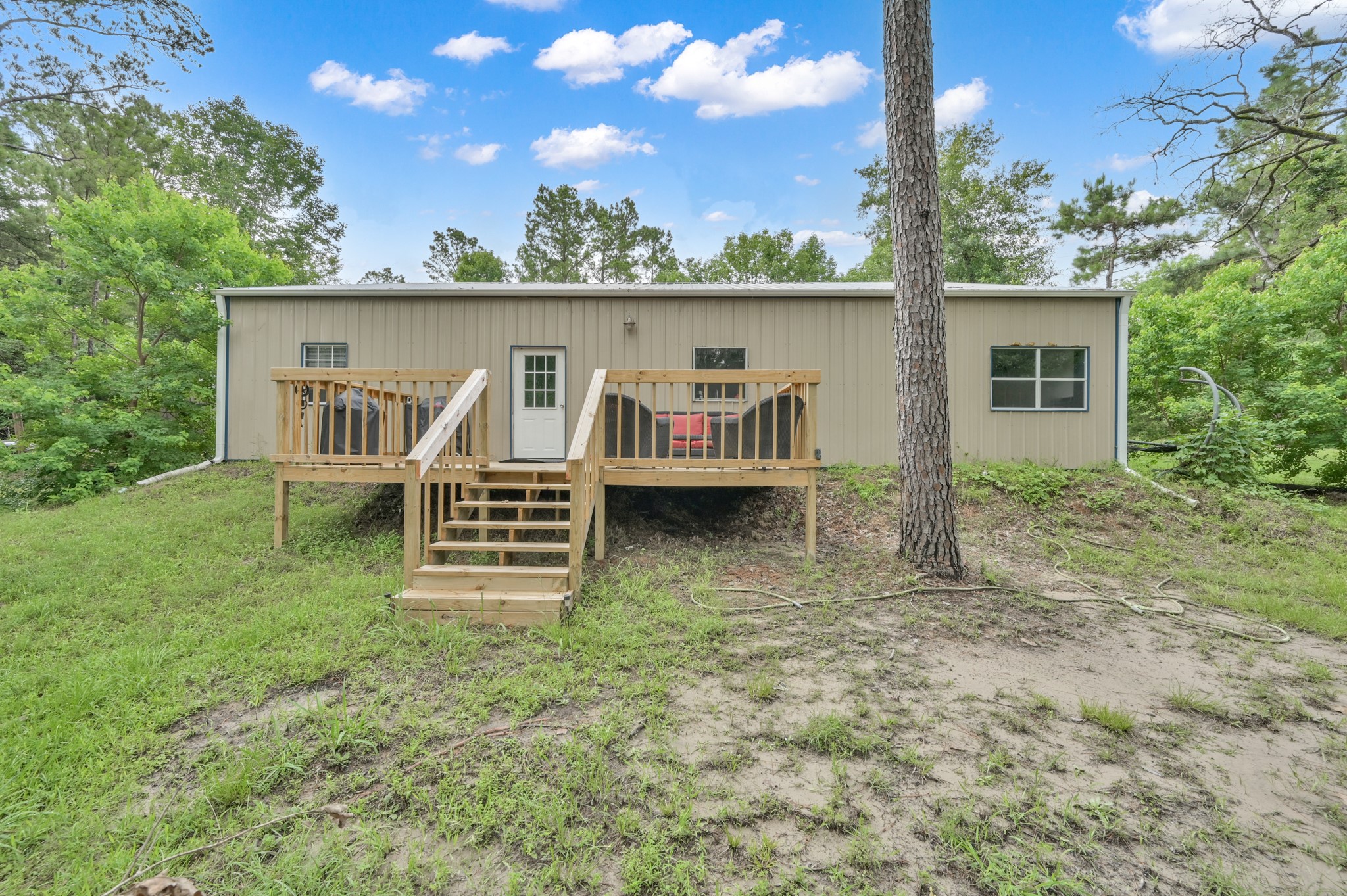 315 Cessna Road Trinity, TX 75862 - Photo 29 of 37 a view of a house with a balcony