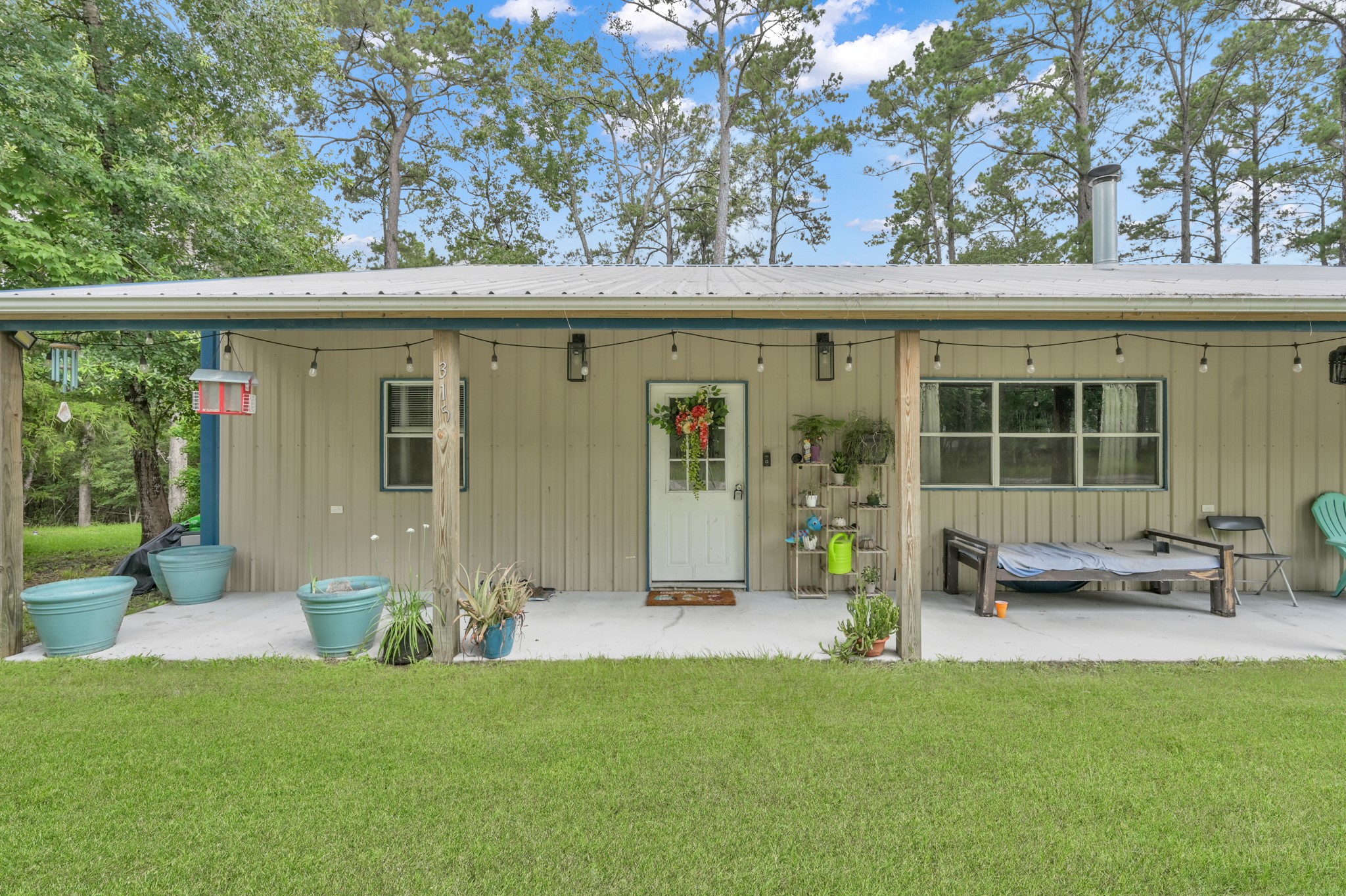 315 Cessna Road Trinity, TX 75862 - Photo 8 of 37 a view of a chair and table in backyard of the house