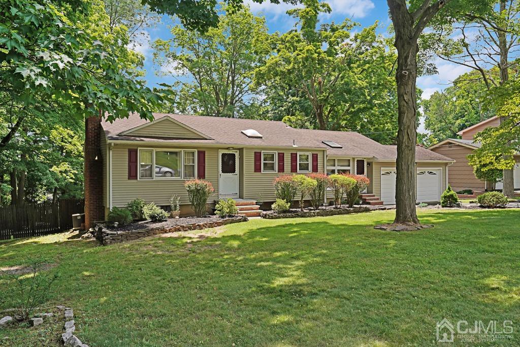 3 Blue Ridge Avenue Green Brook, NJ 08812 - Photo 1 of 30 a front view of a house with garden