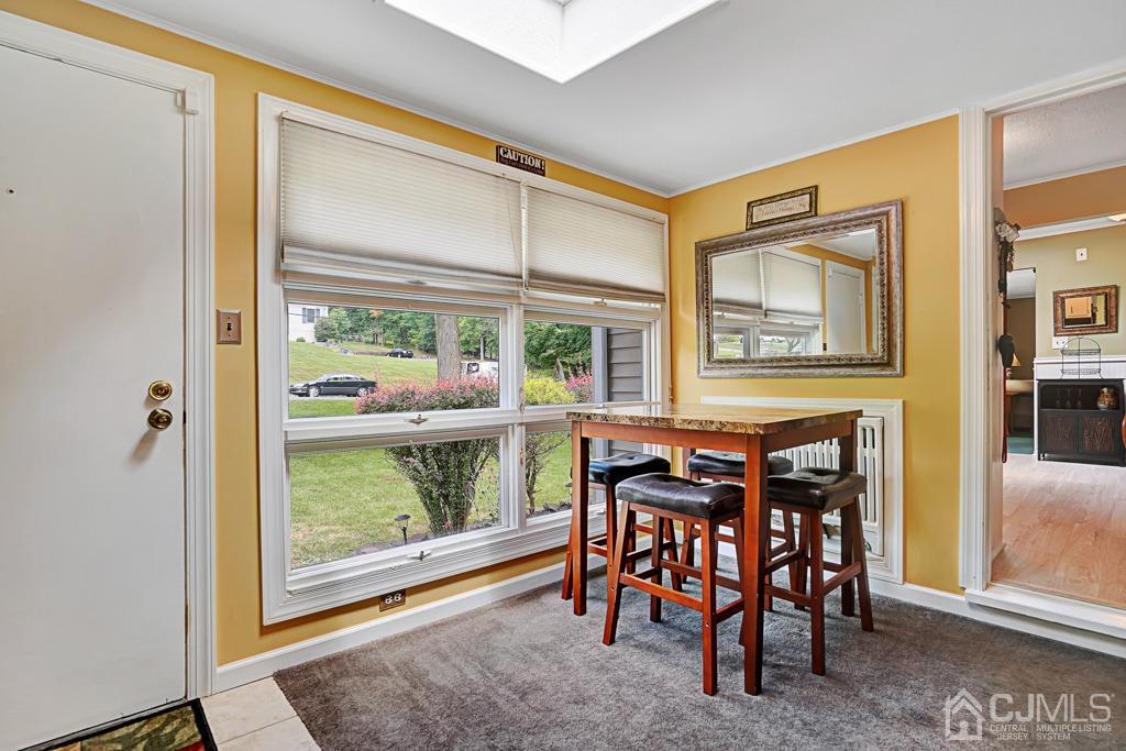 3 Blue Ridge Avenue Green Brook, NJ 08812 - Photo 13 of 30 a dining room with furniture and a window