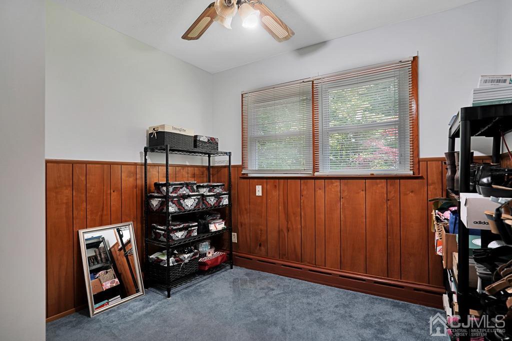 3 Blue Ridge Avenue Green Brook, NJ 08812 - Photo 15 of 30 a view of a room with racks on the wall