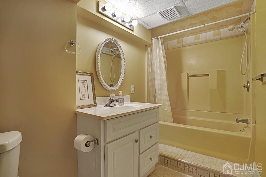 3 Blue Ridge Avenue Green Brook, NJ 08812 - Photo 21 of 30 a bathroom with a sink mirror vanity and toilet