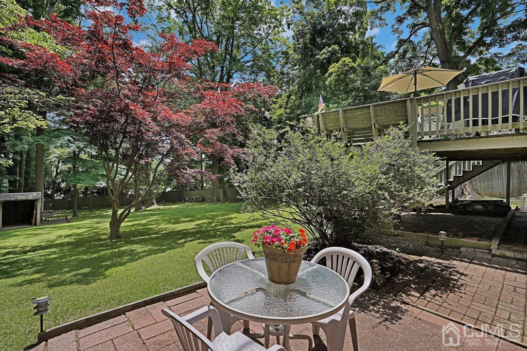 3 Blue Ridge Avenue Green Brook, NJ 08812 - Photo 26 of 30 a backyard of a house with yard and outdoor seating
