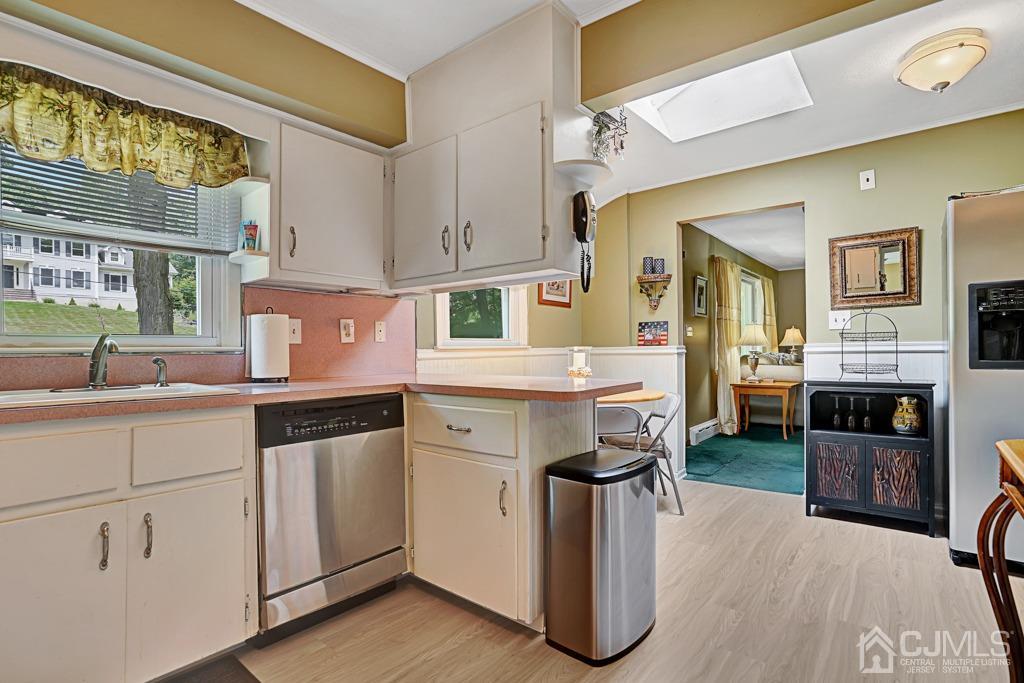 3 Blue Ridge Avenue Green Brook, NJ 08812 - Photo 5 of 30 a kitchen with a sink cabinets and window