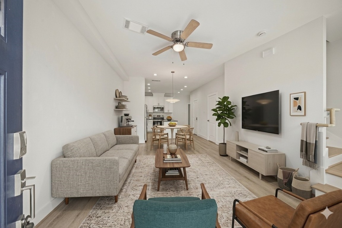 4007 New Orleans Street, Unit B Houston, TX 77020 - Photo 1 of 20 a living room with furniture and a flat screen tv