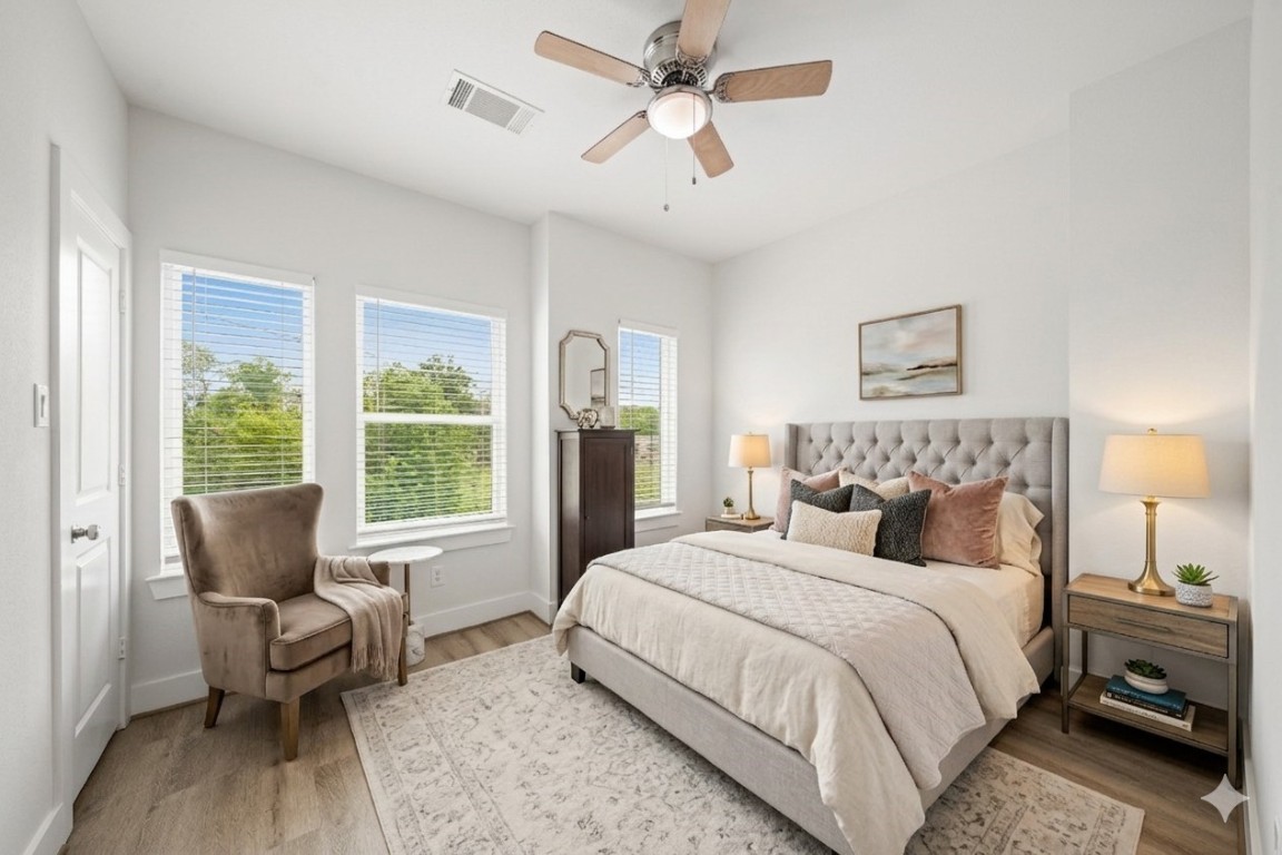 4007 New Orleans Street, Unit B Houston, TX 77020 - Photo 14 of 20 a bedroom with a bed a couch and a window