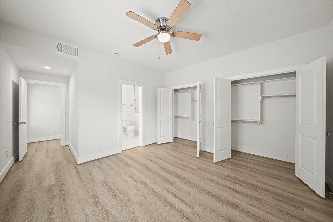 4007 New Orleans Street, Unit B Houston, TX 77020 - Photo 8 of 20 a view of an empty room with wooden floor