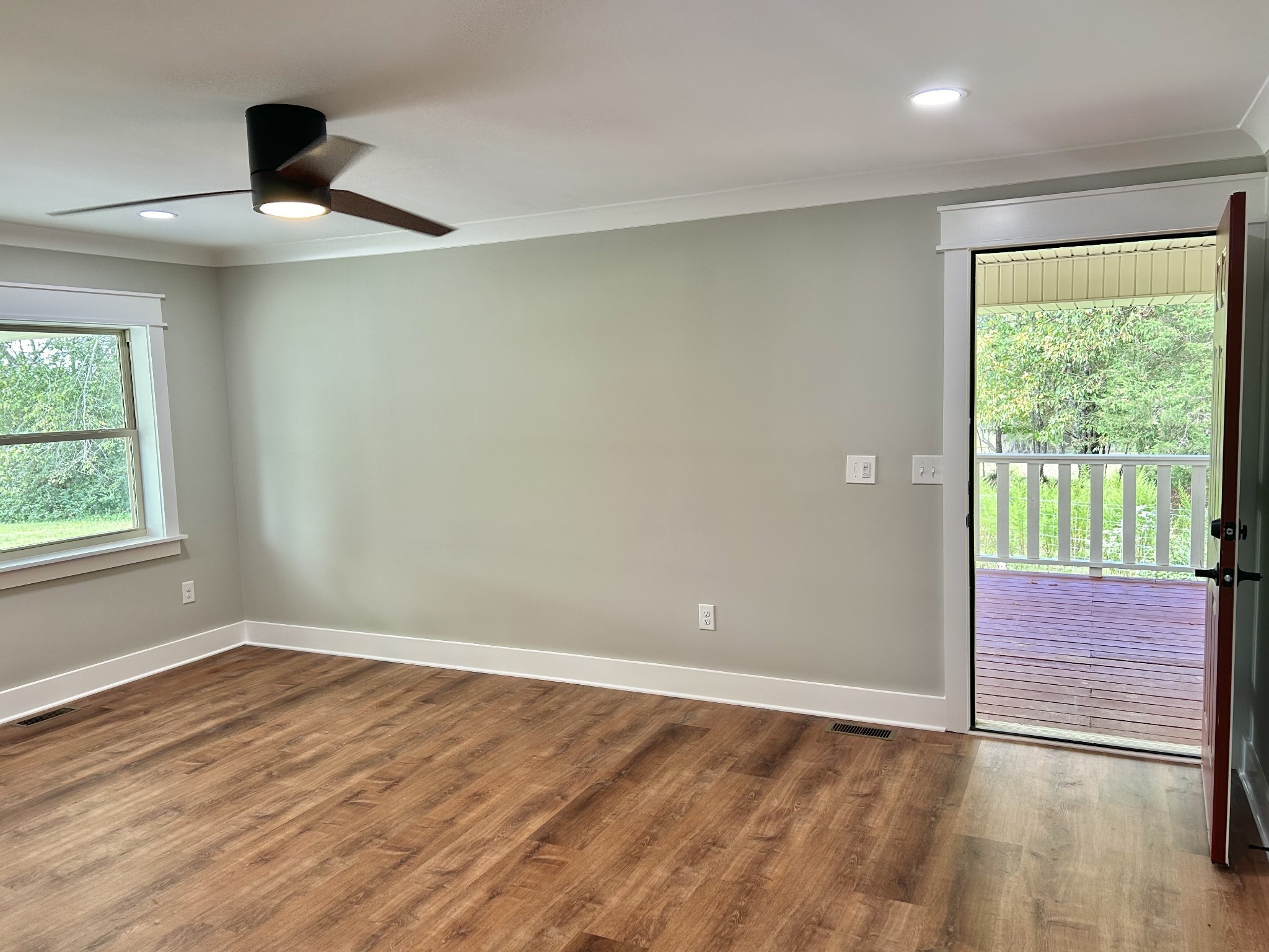 3786 Gnat Hill Road Manchester, TN 37355 - Photo 26 of 71 an empty room with wooden floor and windows