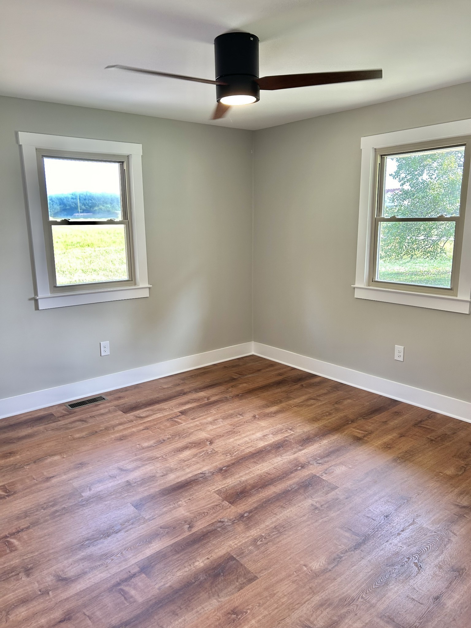 3786 Gnat Hill Road Manchester, TN 37355 - Photo 49 of 71 a view of an empty room with wooden floor and a window