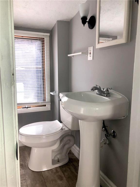 411 Locust Street Elizabeth, PA 15037 - Photo 11 of 22 a bathroom with a sink toilet and a mirror