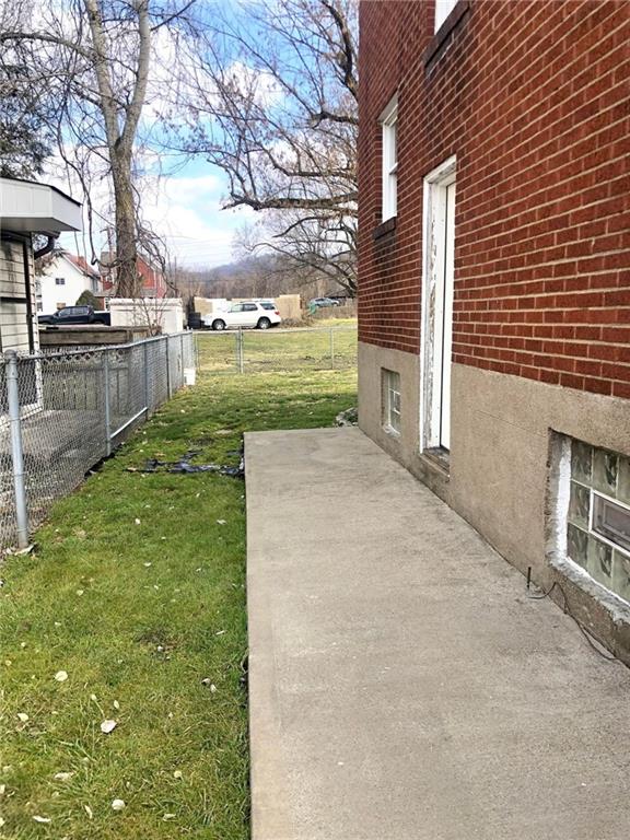 411 Locust Street Elizabeth, PA 15037 - Photo 18 of 22 a view of a backyard with large trees