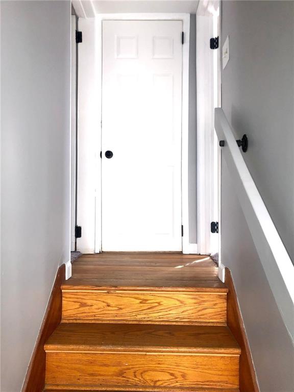 411 Locust Street Elizabeth, PA 15037 - Photo 9 of 22 a view of a room with wooden floor and staircase