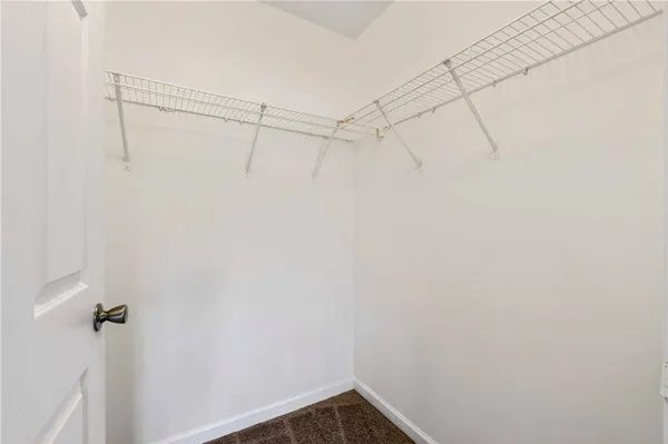 a view of a room with racks on the wall