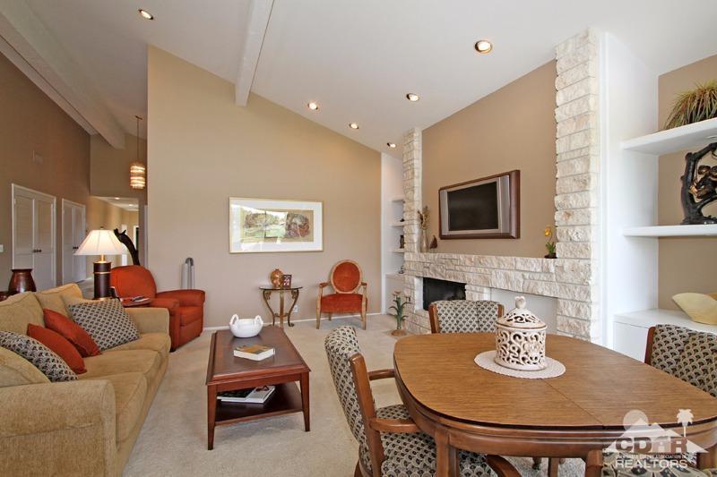 332 Red River Road Palm Desert, CA 92211 - Photo 11 of 40 a living room with furniture and a wooden floor