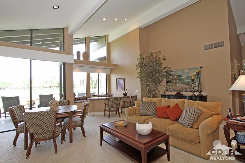 332 Red River Road Palm Desert, CA 92211 - Photo 12 of 40 a living room with furniture and a large window
