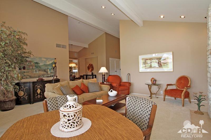 332 Red River Road Palm Desert, CA 92211 - Photo 13 of 40 a living room with furniture and wooden floor