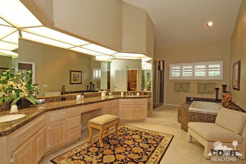 332 Red River Road Palm Desert, CA 92211 - Photo 26 of 40 a large white kitchen with a large window