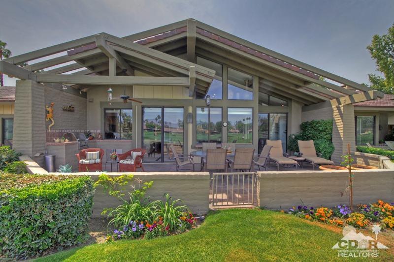 332 Red River Road Palm Desert, CA 92211 - Photo 3 of 40 a front view of a house with garden