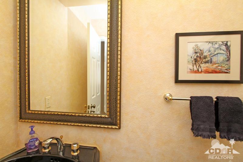 332 Red River Road Palm Desert, CA 92211 - Photo 32 of 40 a bathroom with a tub and shower