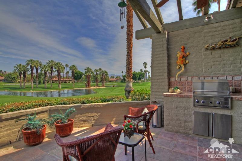 332 Red River Road Palm Desert, CA 92211 - Photo 34 of 40 a view of a chairs and table in the patio