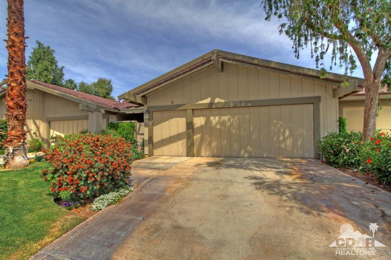 332 Red River Road Palm Desert, CA 92211 - Photo 5 of 40 a front view of a house with garden