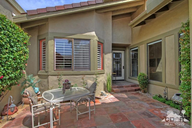332 Red River Road Palm Desert, CA 92211 - Photo 7 of 40 a front view of a house with outdoor seating