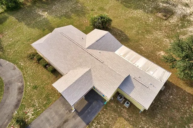 a view of a big room with carpet