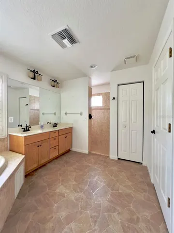 a view of a tree with a yard