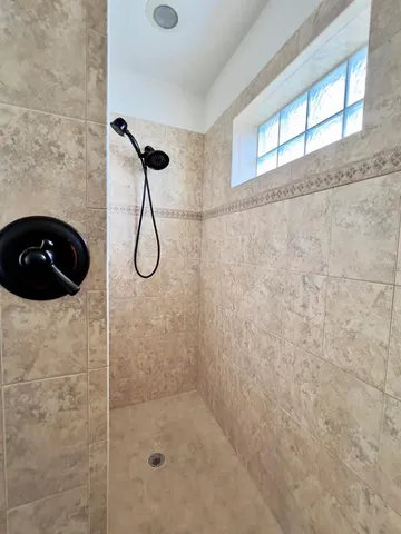 a view of a field with an ocean