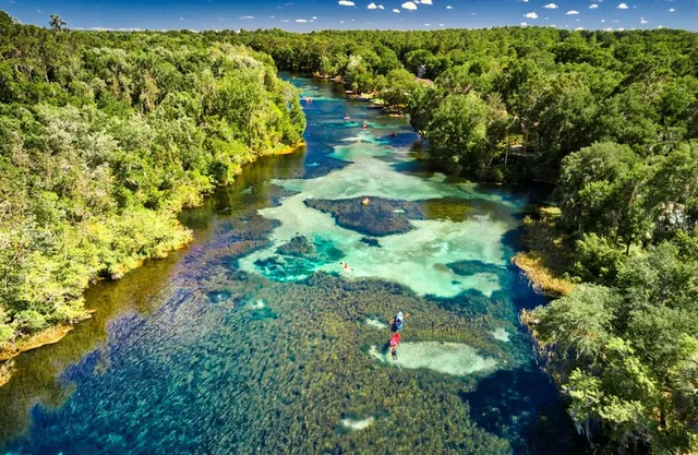 a view of a lake with a big yard