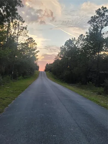a view of an outdoor space and a yard
