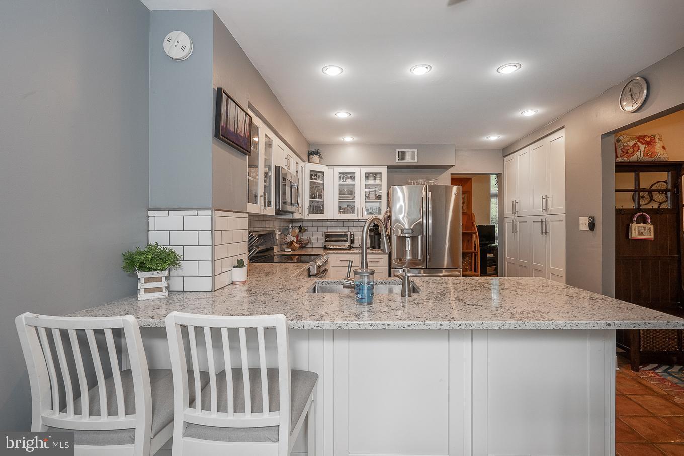4 Scott Court Chesterbrook, PA 19087 - Photo 14 of 48 Open Kitchen with island seating