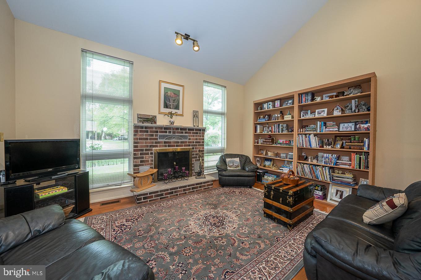 4 Scott Court Chesterbrook, PA 19087 - Photo 17 of 48 Wood burning stove and built in book shelves